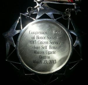 The back side of the medal. Courtesy of Julie Ugarte.