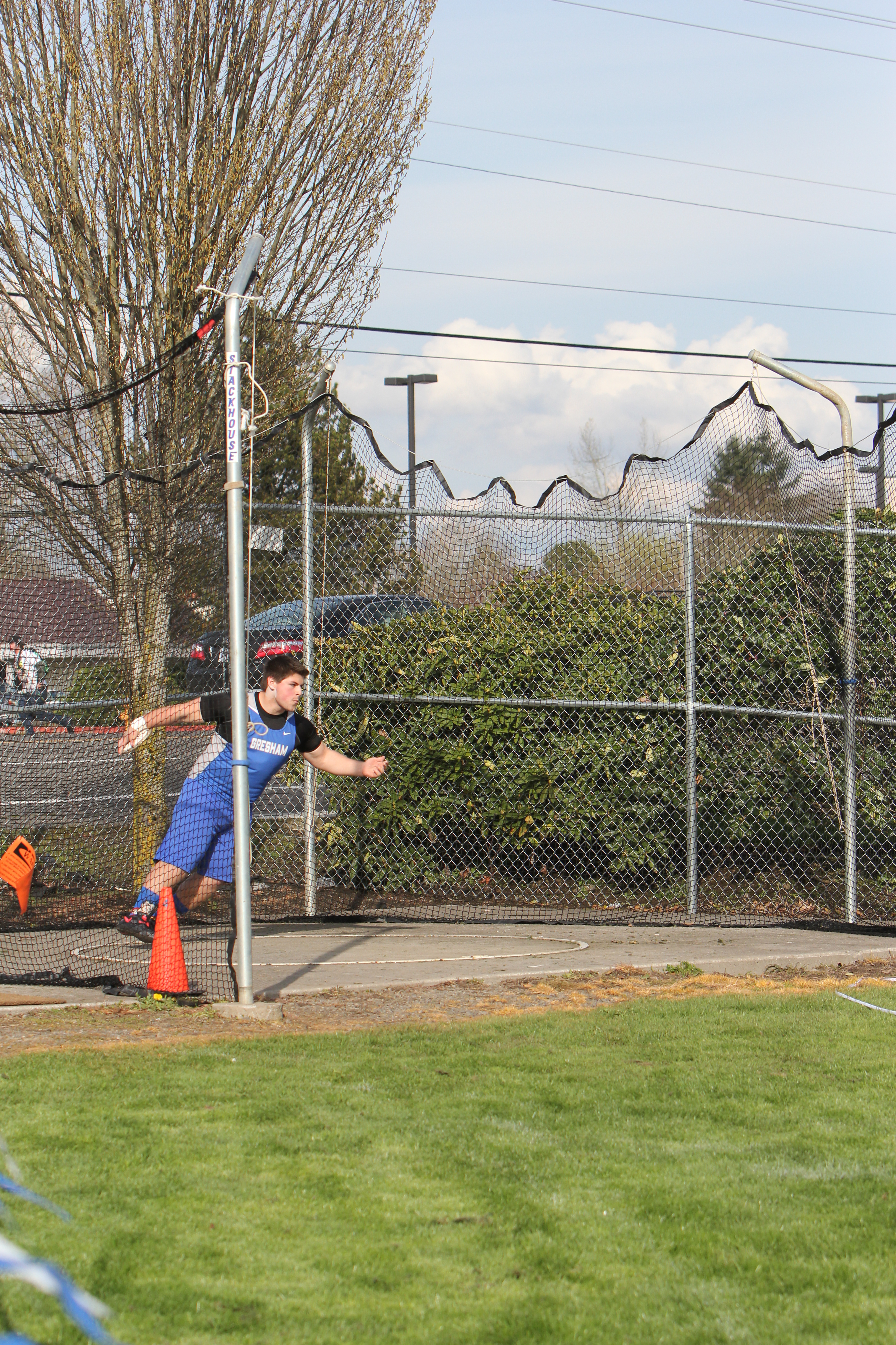 Photo by Teilah Heston Senior Brain Salgado won the men's varsity discus with a throw of 139 feet and 3 inches. Discus was one of two varsity events that saw an all-Gopher sweep.